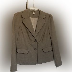 Brown plaid blazer with dark brown piping and gathered details. large